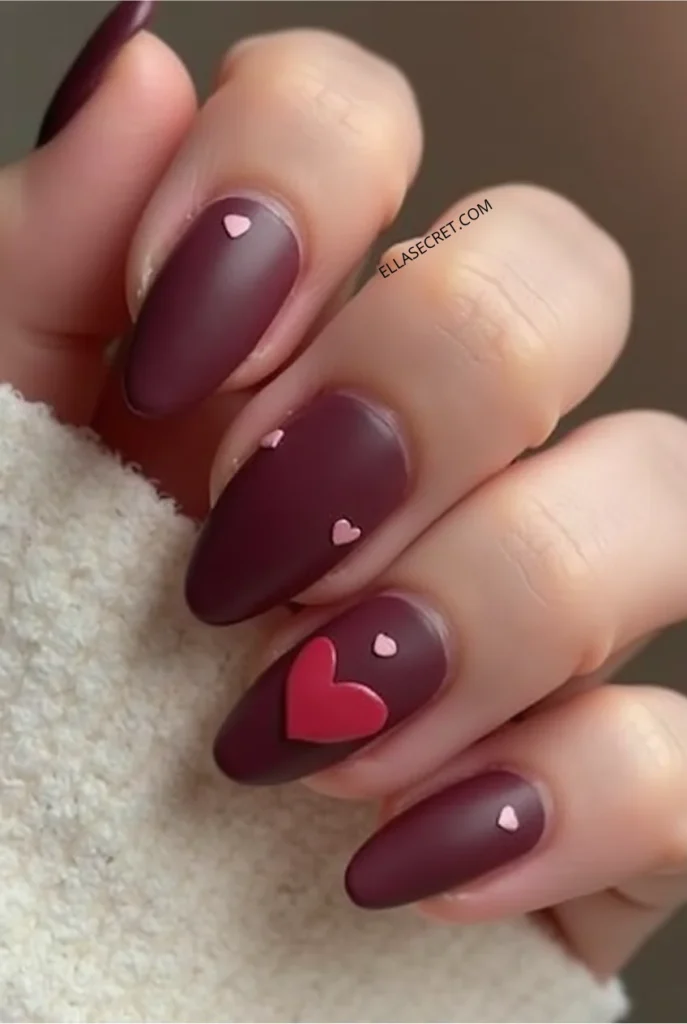 Romantic Valentines Day nails. Almond shape nails_Matte burgundy nails with a soft, velvety finish